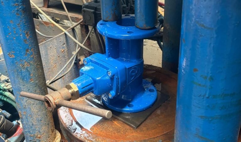 Technician performing hydrostatic pressure test on Devinsan industrial valves in quality control unit